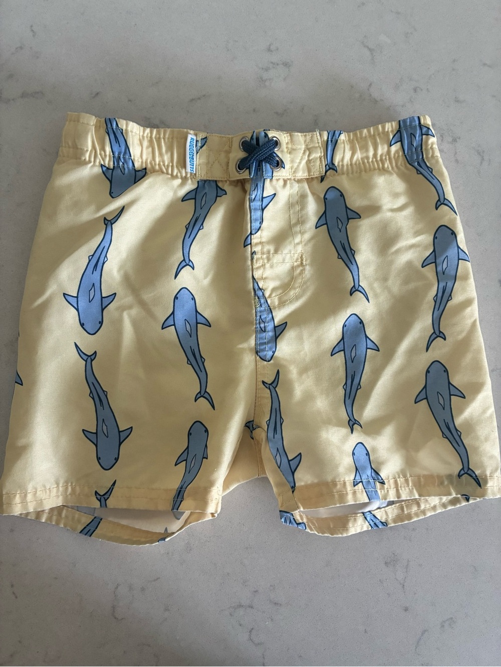 Rugged butts yellow shark swim trunks 💛🦈
4T